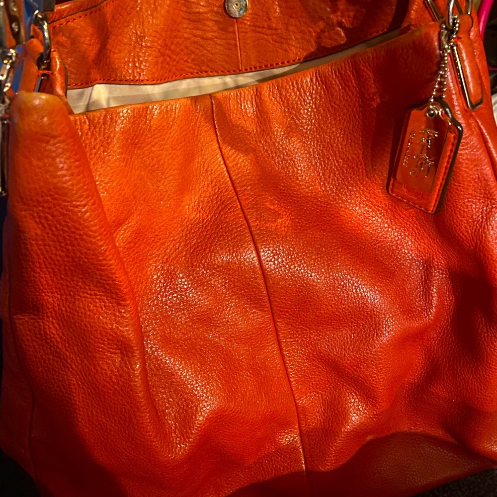Burnt orange coach hobo bag